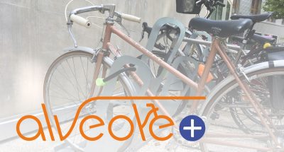 visuel du programme de financement Alvéole+ avec fond vélos