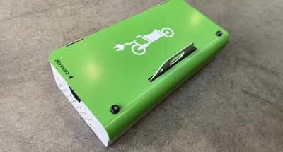 Parking and recharging station for an electric cargo bike