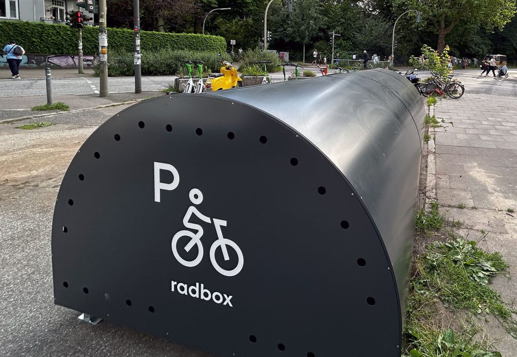 closed ALTAO Cover "Radbox" bicycle rack installed in Hamburg to create a secure bicycle parking area