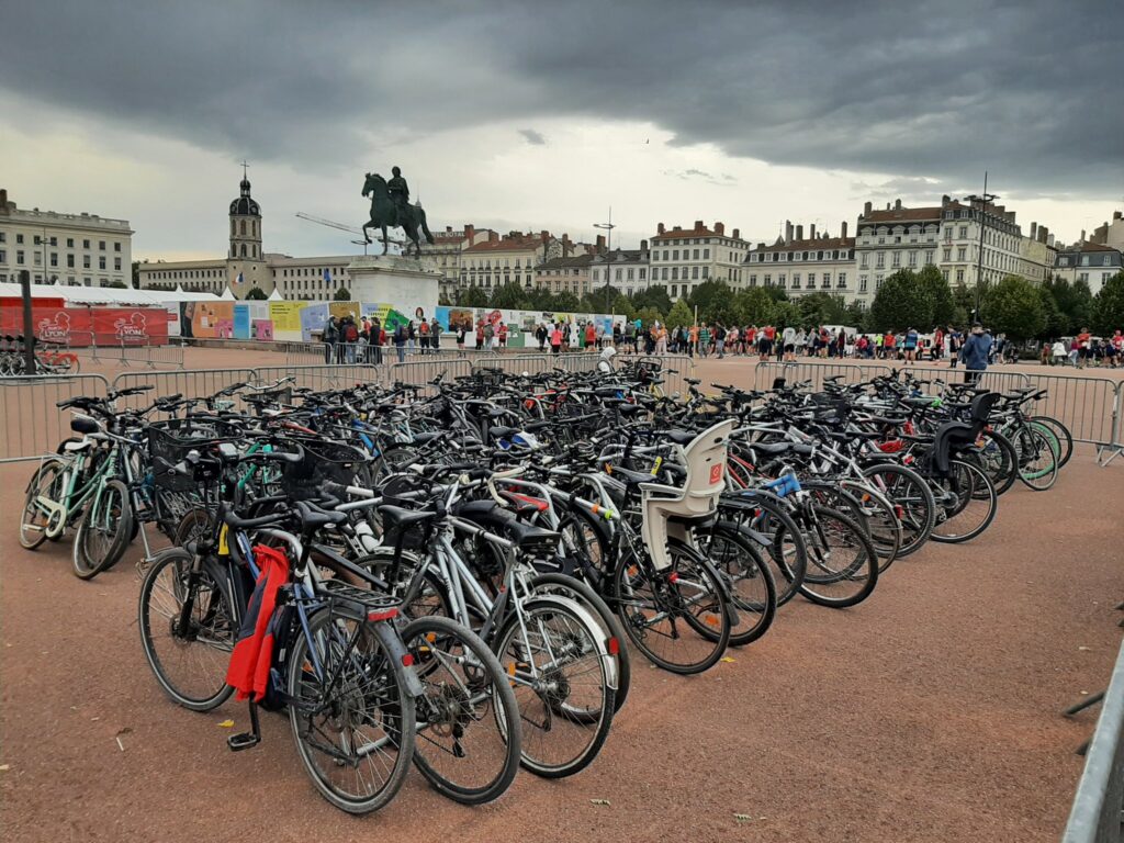 temporary bike park filled with bikes during an event